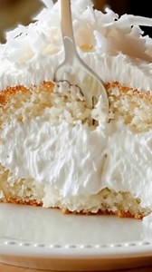 Escape to a tropical paradise with every bite! 🌴🥥🍰 This incredible Coconut Cake is pure bliss. Moist, tender layers infused with coconut, topped with a dreamy coconut cloud frosting, and finished with toasted coconut. It's the perfect treat for any occasion! #coconutcake #tropicaldessert #bakinglove #homemadecake #dessertgoals #sweethtooth Full recipe 👇💬 | All Recipes