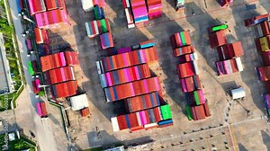 The main function of a container yard is to facilitate the movement of cargo containers between different modes of transportation. Are typically located near ports or other transportation hubs. 4K Stock Video