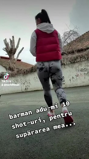 Stylish Outdoor Walk in a Red Puffer Jacket