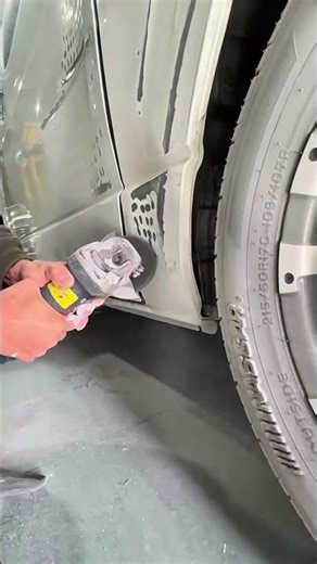 smoothing high quality car surfaces with professional electric grinder for auto body repair projects