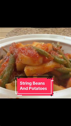 String beans and Potatoes in a light Red Sauce. My grandmother would make this as a side dish or it could be eaten as a main meal. Easy and delicious. 4 medium potatoes cut into chunks 12 oz fresh string beans 4-5 cloves minced garlic 28 ounce can whole peeled tomatoes 1 C water Oregano Salt and pepper 2 Bay Leaves EVOO #stringbeans #potatoes #sidedish #italianfood #italianrecipe