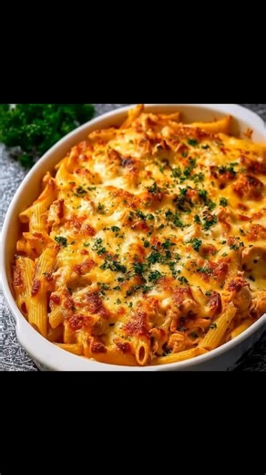 Mary Berry's Chicken Pasta Bake • 300g pasta (penne or fusilli) • 300g cooked chicken, shredded • 400g jar of pasta sauce • 200g cheese, grated (cheddar or mozzarella) • 1 onion, diced • 2 cloves garlic, minced • 1 cup frozen peas • Salt and pepper to taste • Olive oil 1. Preheat the oven to 180°C (350°F). 2. Cook the pasta according to the package instructions until al dente. Drain and set aside. 3. In a large skillet, heat olive oil over medium heat and sauté the onion and garlic until soft. 4