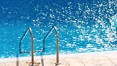 Grab bars ladder in the swimming pool