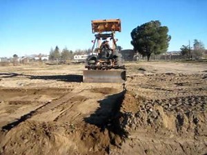 Skiploader Grader at Work with Patrick Juback