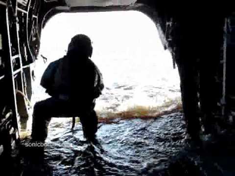 Boat Driving Into Chinook Helicopter