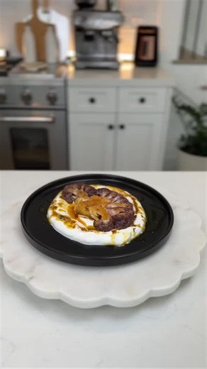 Purple Cauliflower Steak with Yogurt Sauce Recipe Purple cauliflower Olive oil Italian seasoning Salt and pepper Paprika Aleppo Pepper Dried garlic Dried onion Yogurt sauce Greek Yogurt Fresh garlic Salt White pepper Red Sauce Butter Olive oil Paprika Aleppo pepper #shorts #recipe #GourmetGhetto | Gourmetghettos