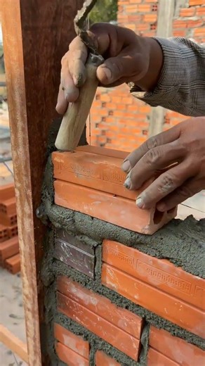 Red Brick Installation with Wall Anchor for Strong and Durable Construction