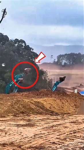 Moment of an Excavator in Heavy Rain