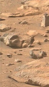Is This a Face on Mars Surface? This rock on the surface of Mars looks like a human face, but it is a natural illusion. Our brain is very good at finding familiar patterns like faces. This effect is called pareidolia. On Mars, shadows, lighting angle, erosion, and camera resolution can make rocks look like faces or structures. Scientists have studied many such images and confirmed they are natural rock formations, shaped by wind, dust storms, and time. There is no scientific evidence of carved f