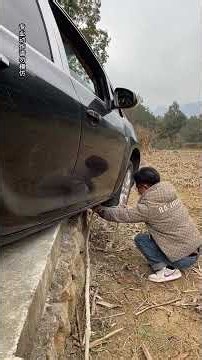 Use recovery strap to free stuck car #Car recovery tips #Safety first #automobile #rainyroad #funny