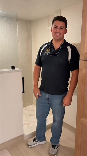 Low-maintenance luxury ✔️ We finished this shower with large hexagon floor tiles, large-format porcelain walls, modified grout, and a rain-textured glass panel. Clean, modern, and built to last. #ShowerRemodel #BathroomRemodel #TileInstallation #LargeFormatTile #HexTile #RainGlass #ModernBathroom #BrevardTile #FloridaHomes #TileDesign #TileContractor #BathroomRenovation #PorcelainTile #ShowerFloor #HomeRenovation #TileWork | Brevard Tile