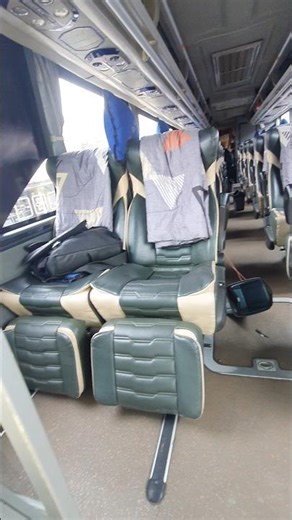 2-2 luxury bus seating with leg rest support for maximum comfort on long trips #BusInterior #bus