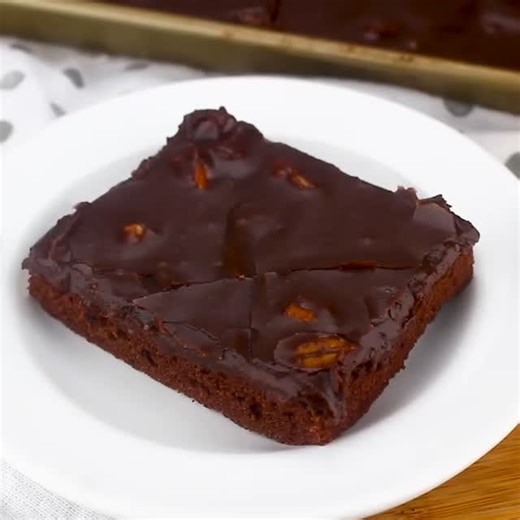 This really is The Best Chocolate Sheet Cake~ Ever! So chocolatey and rich! You will be hearing moans and groans from anyone who takes a bite! https://mooreorlesscooking.com/2012/09/18/best-chocolate-sheet-cake-video/ | Moore or Less Cooking Blog