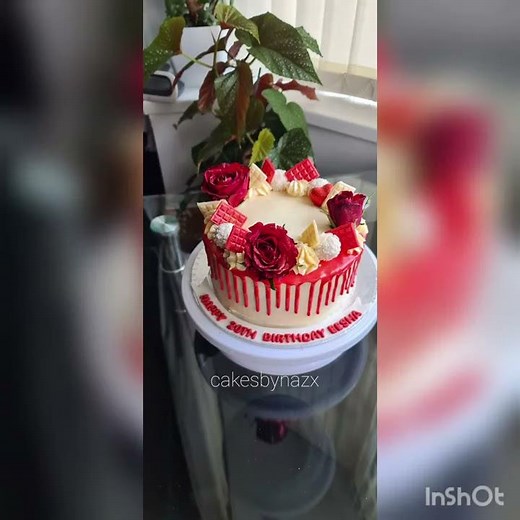 red velvet cake with cream cheese frosting and red chocolate drip