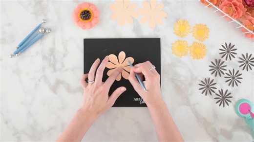 Have you tried making these paper Zinnia flowers? They are an easy, beginner-friendly flower and are perfect for shadowboxes, wreaths, gift toppers, or stemmed for arrangements for your home! Watch the tutorial to create it here! https://www.youtube.com/watch?v=QfcaikIoXvM | Abbi Kirsten Collections