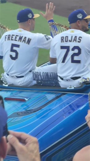 Freddy Freeman, Miguel, Rojas, and Will Ferrell bring out the back to back World Series trophy! ￼