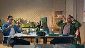 Relaxed Guys Enjoying Break Creative Office. Designers Having Fun Throwing Ball Stock Footage - Video of creative, modern: 285344030