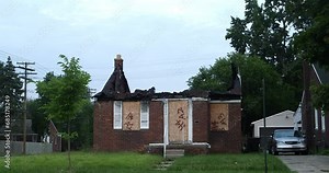 Fire damaged homes in Detroit waiting to be demolished.