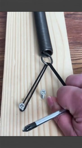 Genius trick to hook a spring onto a screw easily without hurting your fingers #lifehack #DIY #tools