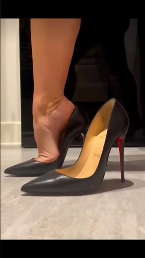 Trying on Christian Louboutin So Kate high heels