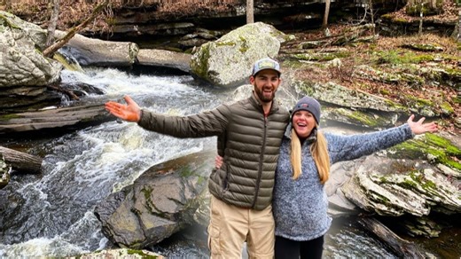 Hiking beautiful mountain with pregnant wife on adventure trip