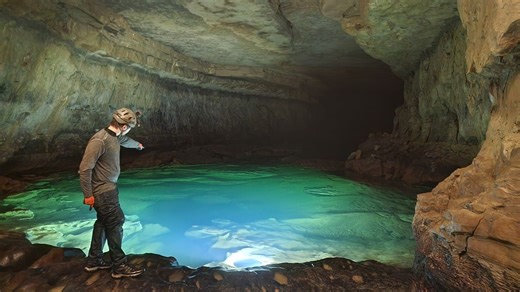 They went deeper into a river cave and found a 280ft waterfall