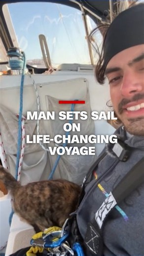 CNN’s Anderson Cooper speaks with Oliver Widger, who decided to quit his job to buy a boat and sail around the world with his rescue cat after being diagnosed with a rare bone disorder. | CNN