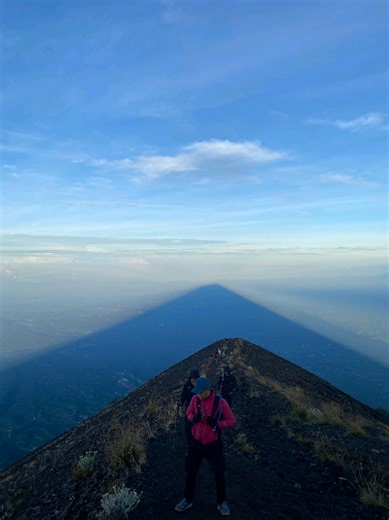 Mount Agung is the highest and most sacred mountain in Bali. Standing at approximately 3,031 meters above sea level, it is located in Karangasem Regency and holds deep spiritual significance for the Balinese people. For Balinese Hindus, Mount Agung is believed to be the dwelling place of the gods and is considered the spiritual axis of the island. Many important temples in Bali, including the famous Besakih Temple, are oriented toward Mount Agung, as it represents the most sacred direction in re
