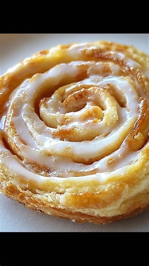 These glazed Danish pastries remind me of lazy Sunday mornings at my grandma's kitchen table, where we'd savor the first warm bite before they'd disappear. Trust me, one is never enough! You’ll find the full recipe in the comment below 👇 | Recipes & Cooking Guide