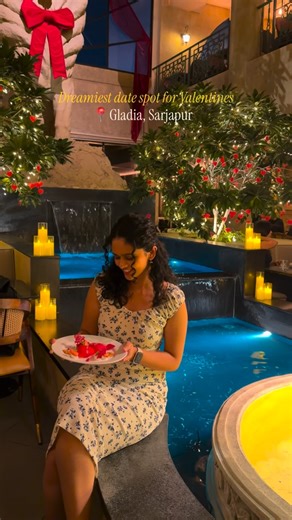 Shruti | Travel • Cafes • Stays on Instagram: "‼️Bangalore, this is your sign to romanticise your Valentine’s plans ❤️✨ Gladia turned into a full Roman dream for the season. Dramatic decor, roses everywhere, and the prettiest vibe for a date night or Galentine’s. Here’s what we tried from their Valentine’s menu: 🥟 Velvet Love Dim Sum – instantly obsessed 🌸 Blush & Bloom – dish of the day for me 🍣 Blush Garden Roll – so yum 🍤 Prawns – my girl ordered these and WOW 🍕 Mushroom Pizza – simple b