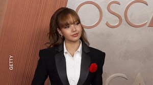 ‘White Lotus’ star Lisa suits up on red carpet before her performance at Oscars 2025