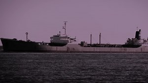 A cargo ship with 34 crew capsized before dawn