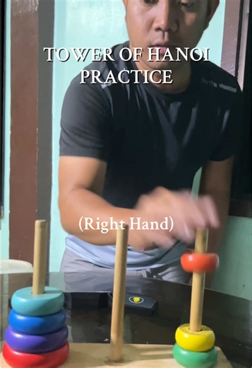 Tower of Hanoi Challenge: Mastering Both Hands