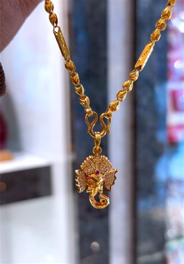Gold chain and Ganesh locket Weight: Chain 1 tola and Locket 36 lal Location📍:thaiba-14 Godawari Lalitpur Cantact: 9848854268 WhatsApp/Viber Call 📞 :9803550198 #bandkjewellers #goldchain #goldlocket #goldjewelry #creatorsearchinsights