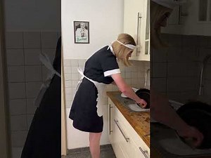 Maid is doing the dishes