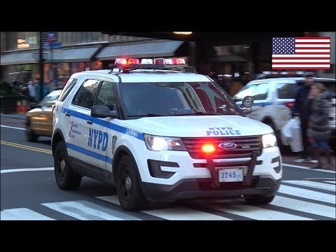 NYPD Police cars responding with horn, rumbler siren and lights