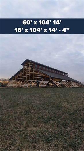 Take a look at Construction Crew 8 raising this stunning pole barn with a sleek monitor roof design! The post-frame building size is 60' x 104' x 14' 16' x 104' x 14'-4". Located in Valparaiso, Indiana. 🤩 . . . #fbibuildings #polebarn #postframe #construction #constructionlife #constructionsite #constructionworker #qlyft #reel #reels #reelsfb #reelsvideo | FBi Buildings, Inc.