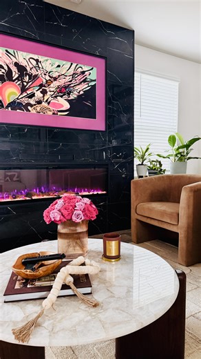 Alicia Taylor on Instagram: "Sharing one of my biggest projects created in my home. When I arrived to look at the place, there was a very tiny fireplace that I immediately decided had to go. In such a small space I knew I needed a big impact and this installation was just what it needed. An electric fireplace was installed that gave off a beautiful feeling with multiple color options and offered heat as well if needed. Also added was my @samsungtv smart frame tv and I’m very pleased with the ove