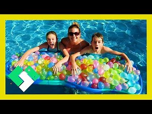 EPIC 300 WATER BALLOON FIGHT! KIDS VS PARENTS! (Day 1889) | Clintus.tv