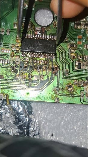 “Soldering an IC onto a PCB.