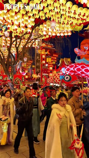From glowing fish lanterns to costumed parades, the Hetou Old Street jazzes up the nighttime vibe in traditional Chinese style in Tangshan, north China's Hebei Province. | People's Daily, China