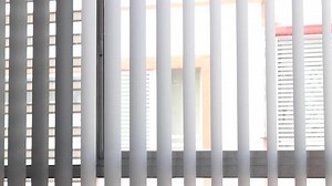 clip-1068426506-custom-vertical-blinds-closing-on-window--