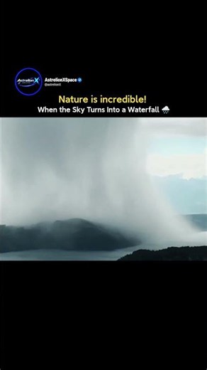 A rare microburst turning the sky into a giant waterfall.🌧️⚡