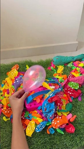 Colourful balloons popping! Electric balloon machine