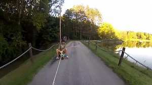 Kid Falls Off While Getting Pulled by Car on Tricycle