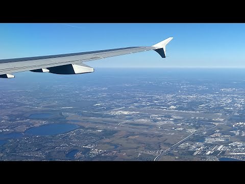 American Airlines Airbus A321-200 landing at Orlando International Airport (MCO)