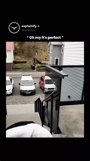 sci || tech || history on Instagram: "This video captures a rare moment of visual perfection created purely by angle, reflection, and coincidence—a phenomenon known as a “perspective illusion.” What looks like a single car painted in two different colors is actually the result of a red vehicle parked outside being perfectly aligned with the reflection of a white vehicle in the glass panel of the staircase structure. When the camera is positioned at just the right spot, the reflective surface mer