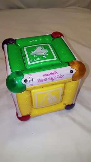 Munchkin Mozart musical magic cube toy orchestra instruments
