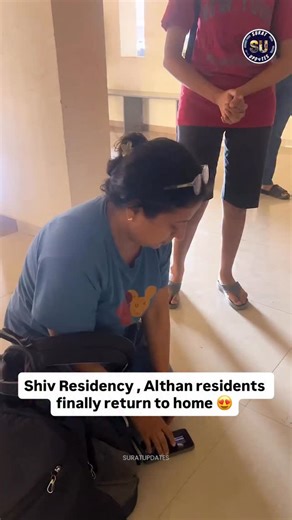 Relief for residents of Shiv Residence in Althan as the building’s structural stability report has come back positive. With the clearance, visible relief and smiles were seen on residents’ faces. Many expressed gratitude by offering prayers before re-entering their homes, touching the threshold as part of the traditional griha pravesh. #suratcity #surat | Suratupdates