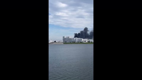 Japan airport fire spreads through hangar causing panic among passengers